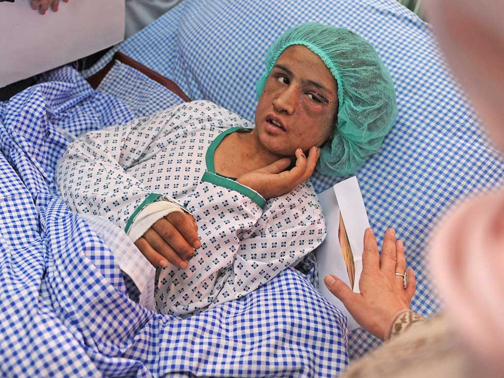 Sahar Gul speaks to the Minister of Women’s Affairs as she recovers in hospital last December