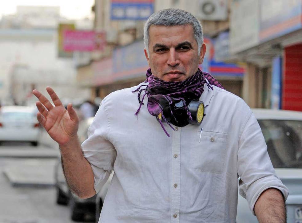 Bahraini human rights activist Nabeel Rajab walks on a street during an anti-government protest held in downtown Manama