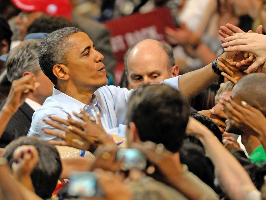 Barack Obama presses the flesh in Richmond, Virginia, as his re-election campaign gets underway