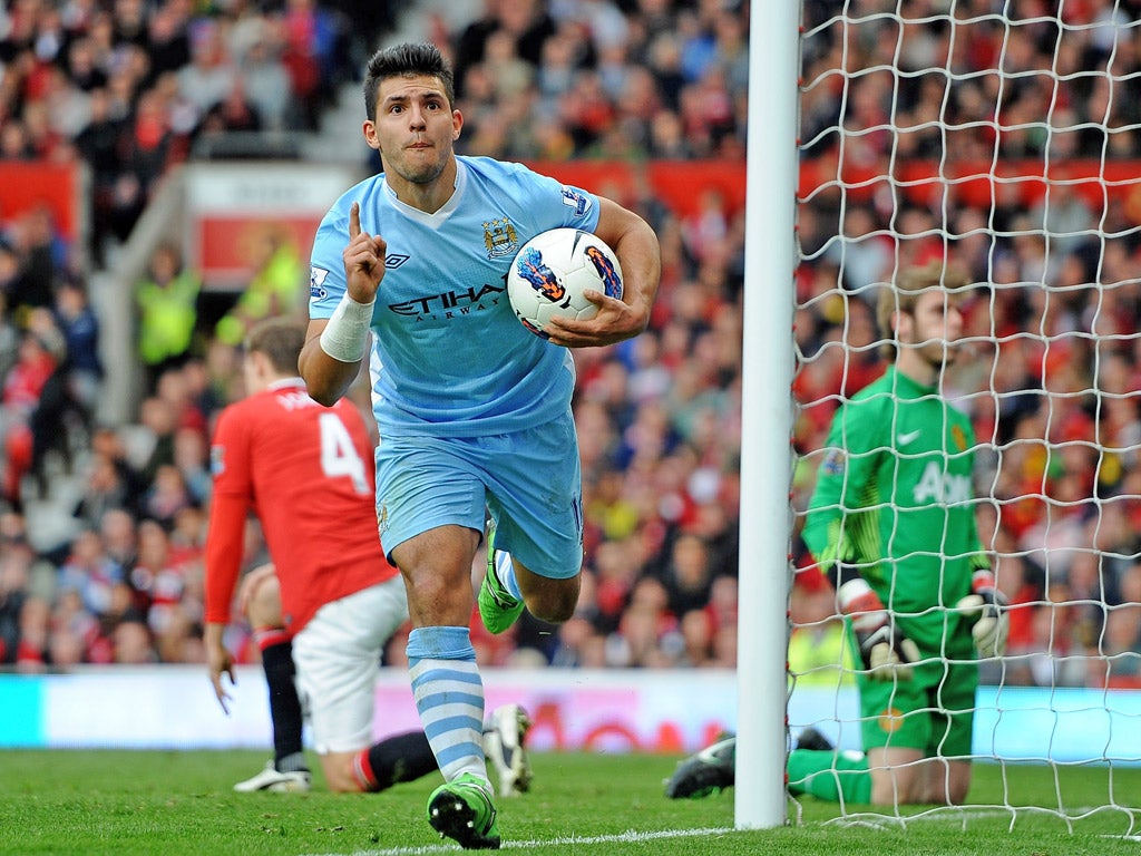 Manchester City’s Sergio Aguero celebrates scoring
during the 6-1 mauling of title rivals Manchester United at Old Trafford in October