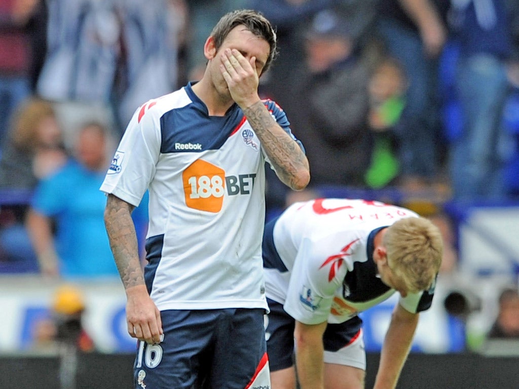 Bolton’s Mark Davies shows his dejection after West Bromwich’s late leveller on Sunday