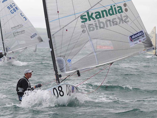 Giles Scott leads four times Olympic gold medallist Ben Ainslie to win the Finn national championship in Falmouth