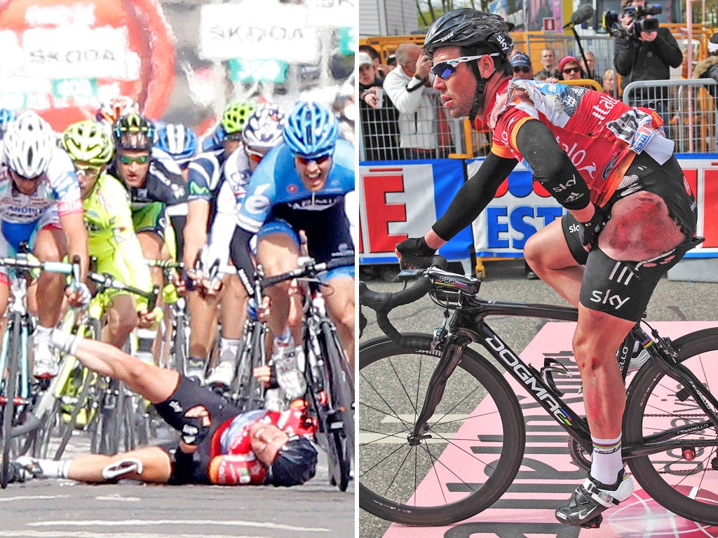 Mark Cavendish hits the ground at speed, but eventually crosses finish line minus several layers of skin