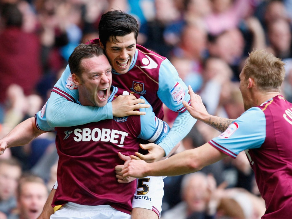Kevin Nolan is congratulated after scoring West Ham’s first goal against Cardiff City