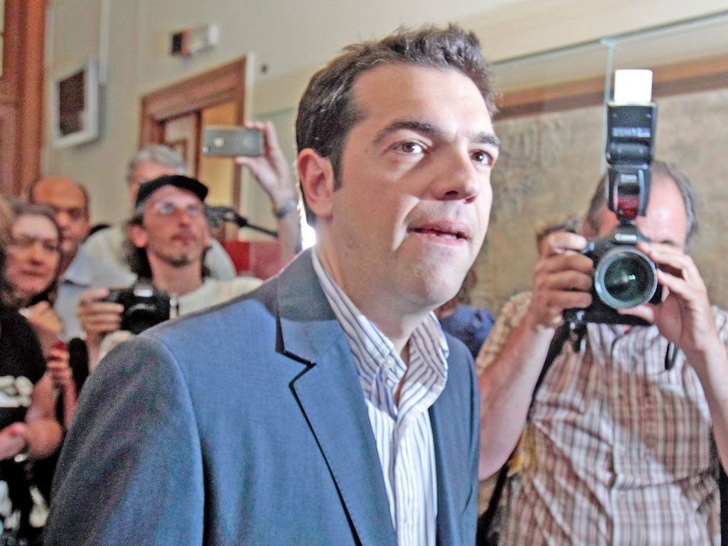 Syriza leader Alexis Tsipras arrives for talks yesterday
