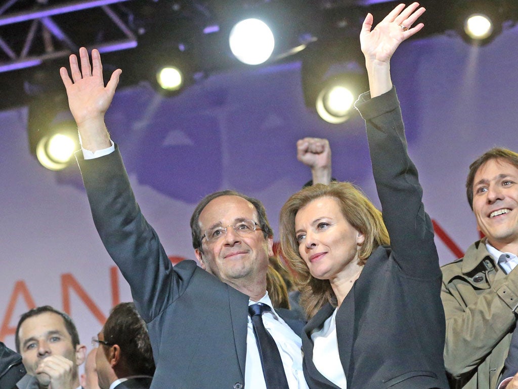 François Hollande with his partner, Valerie Trierweiler, in Paris yesterday