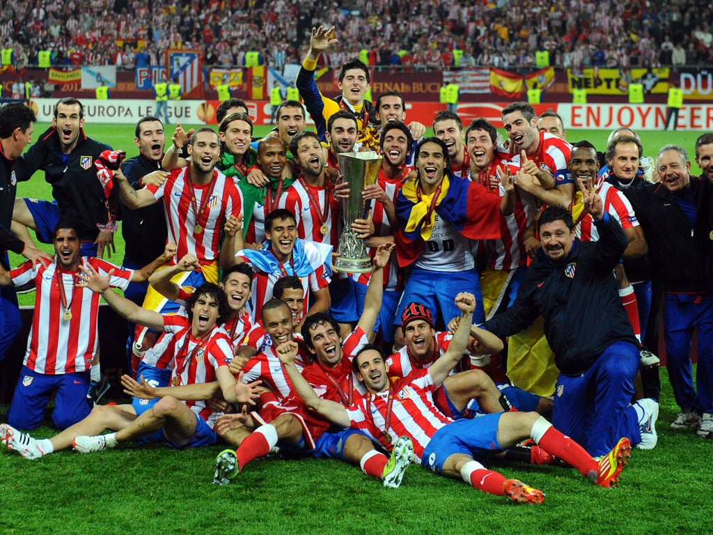 Atletico Madrid celebrate with the trophy