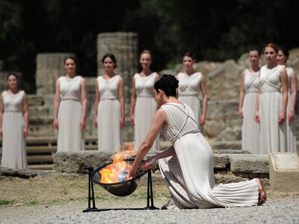 Olympic flame lit in Greece ahead of torch relay across Britain before ...