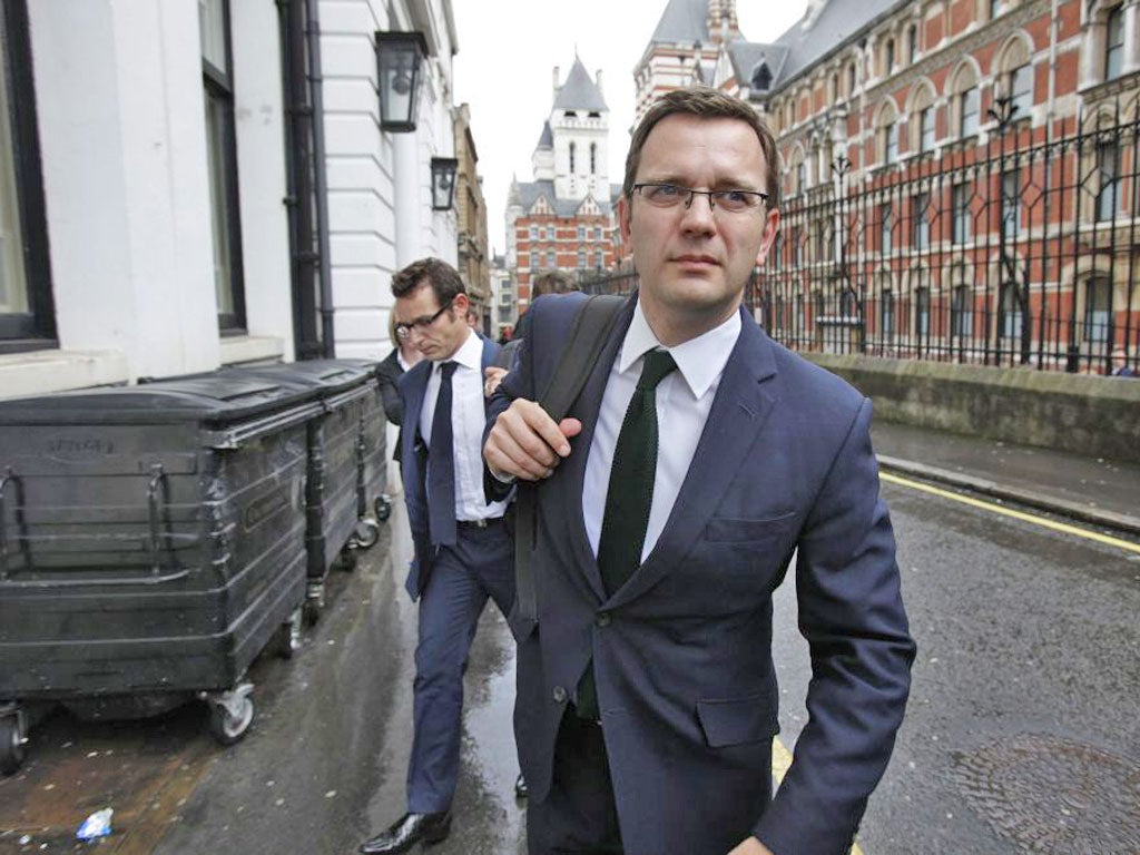 Andy Coulson leaves the Leveson Inquiry yesterday after giving evidence