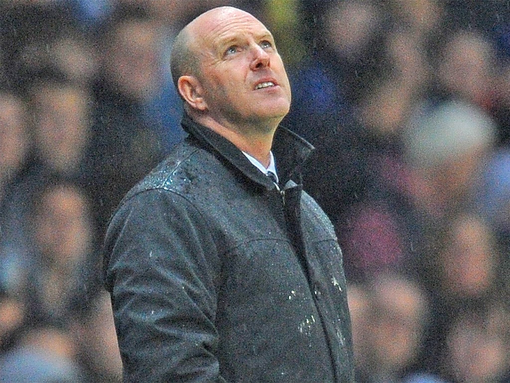 Rovers' Steve Kean volunteered himself as the wally without a brolly against Wigan