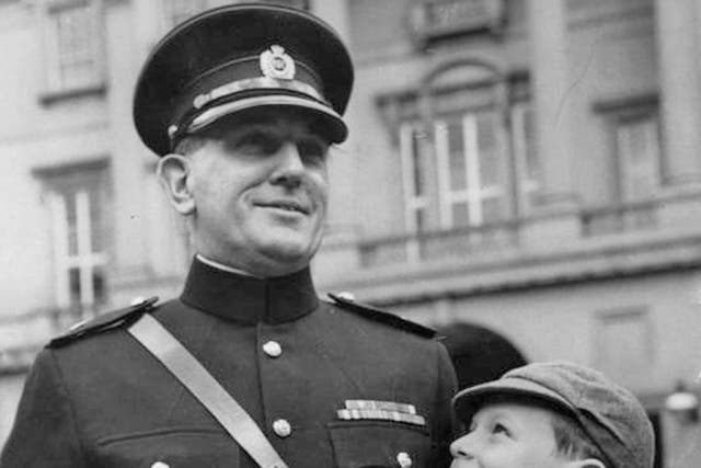 Qualtrough with his son Henry after receiving the George Medal in 1967