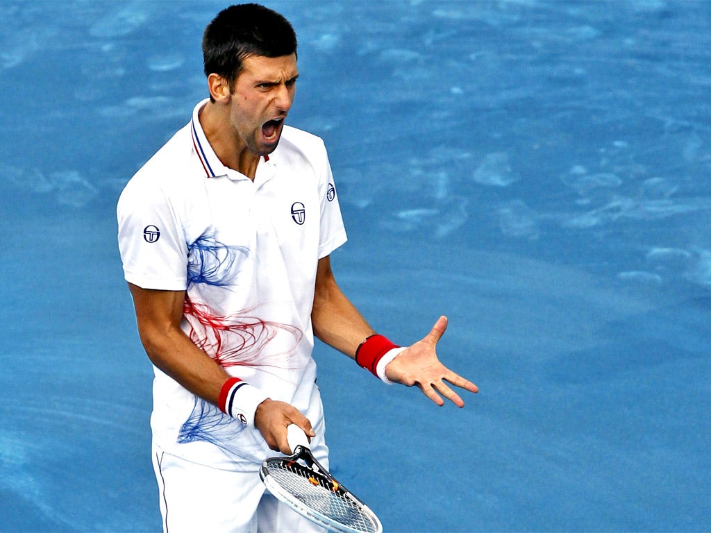 Novak Djokovic shows his frustration at losing in Madrid yesterday