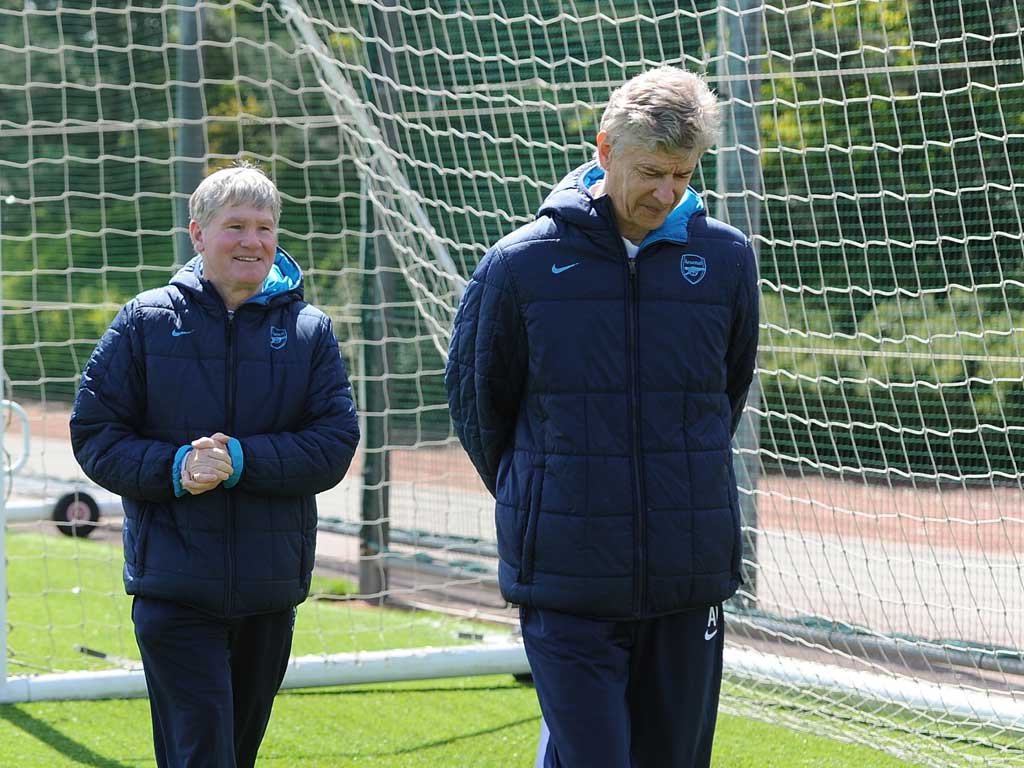 Past man Pat: Arsène Wenger's assistant Pat Rice (left) retires today