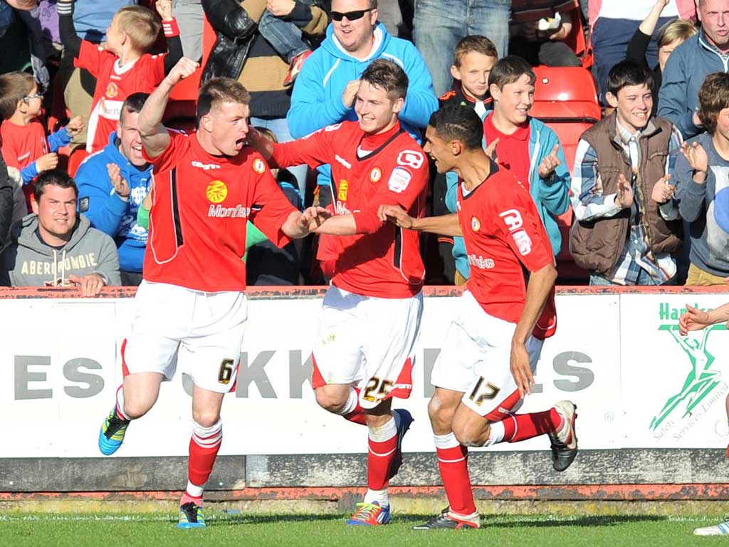 Dug deep: Crewe's Adam Dugdale (left) celebrates his goal against Southend