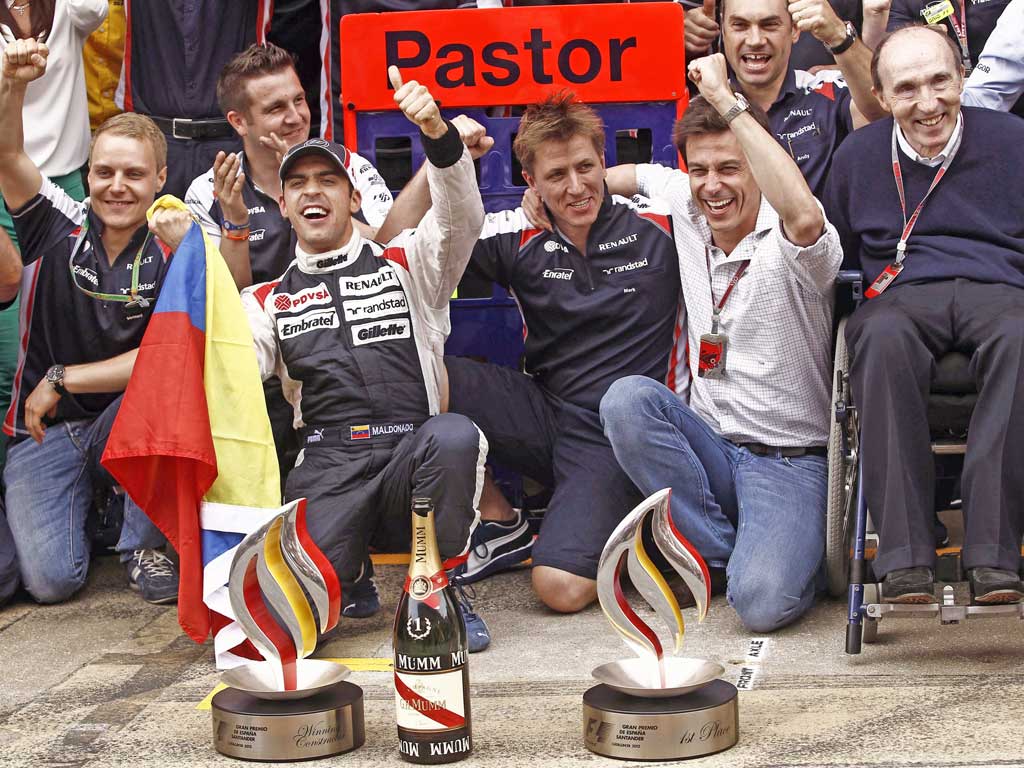 Pastor Maldonado (left)and Sir Frank (right) celebrate Williams’ first
grand prix win since 2004