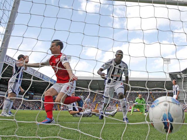 Laurent Koscielny scores the goal that ensured Champions League football for Arsenal