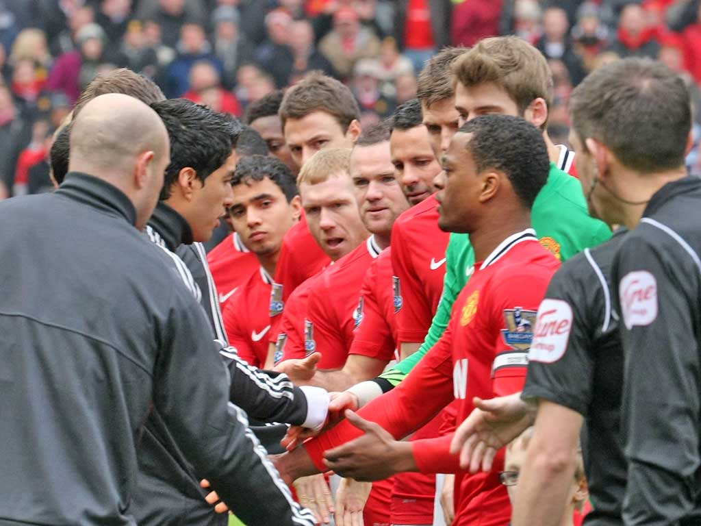 The eyes of the world – certainly the United players – were on Luis Suarez as he opted to refuse to shake Patrice Evra’s hand