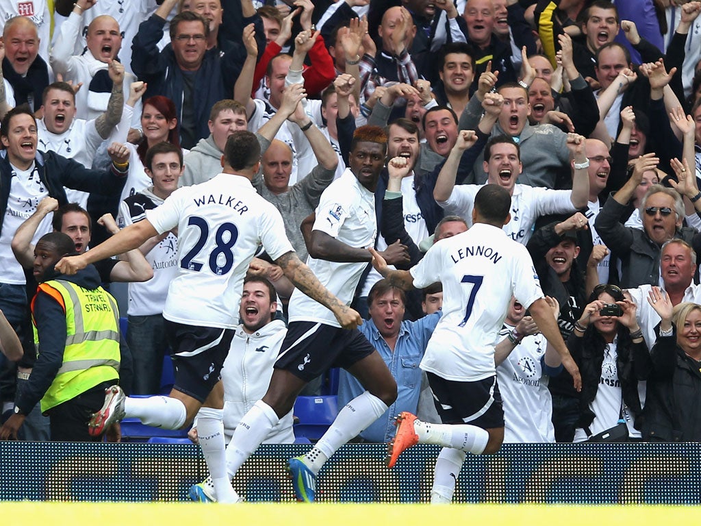 Adebayor celebrates his goal against Fulham