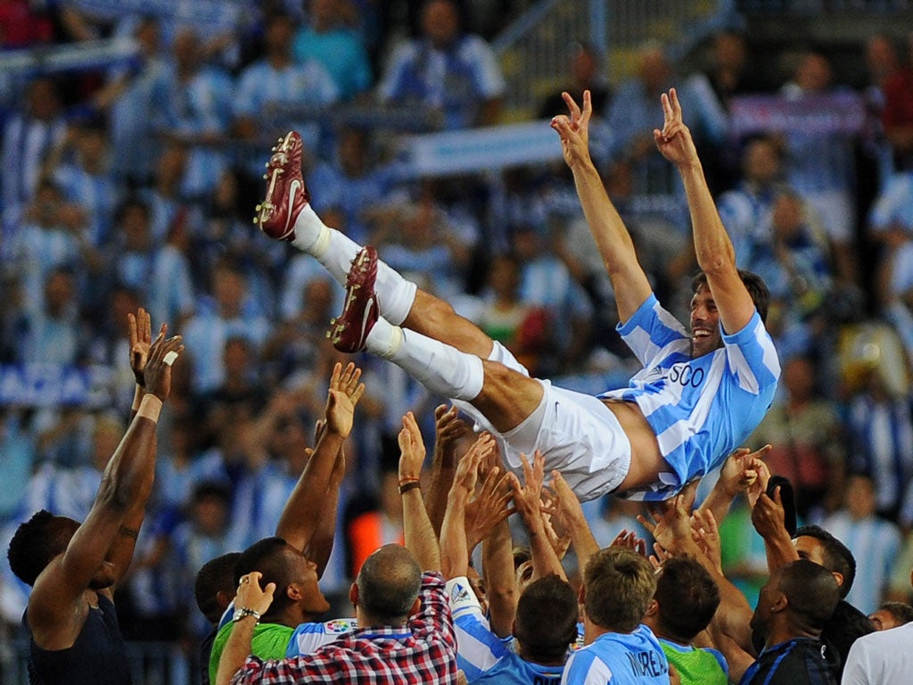 Ruud van Nistelrooy helped Malaga qualify for the Champions League