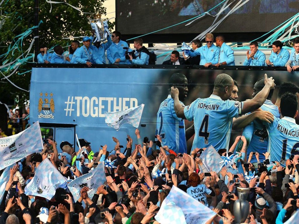 Manchester (well, half of it) takes to the streets as Mancini’s men celebrate title