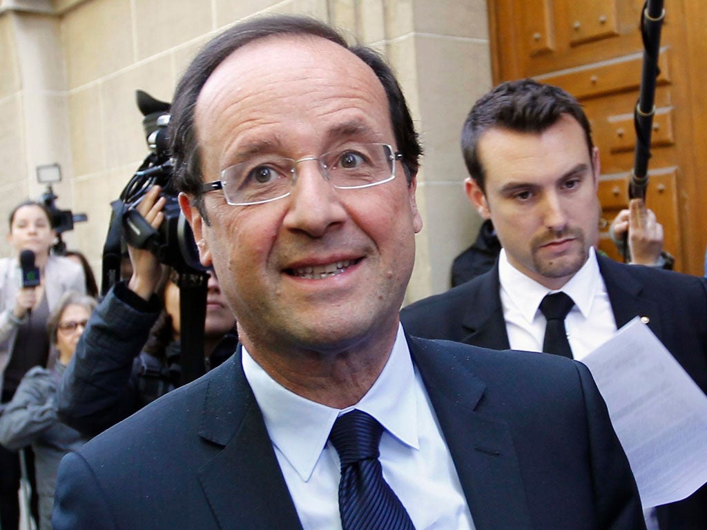 François Hollande prepares for his meeting with Ms Merkel today