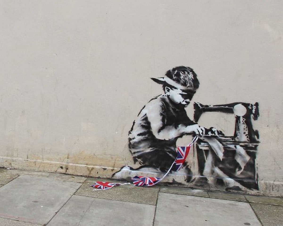 Banksy art ripped out of building wall by UK landlord