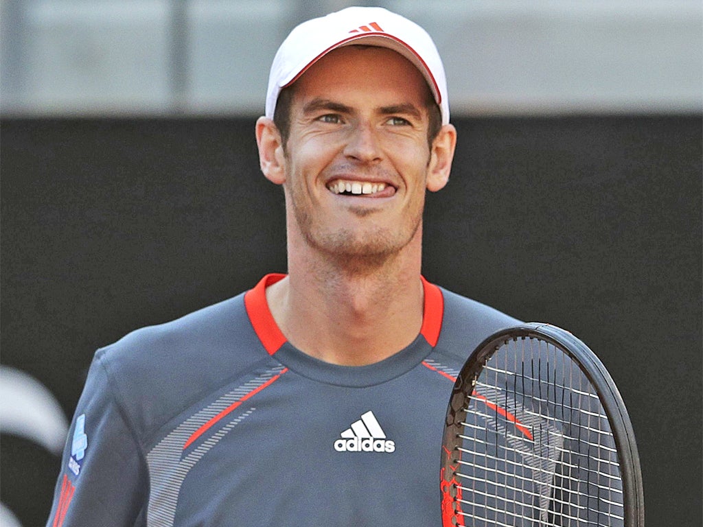 Andy Murray smiles on his birthday while beating David Nalbandian