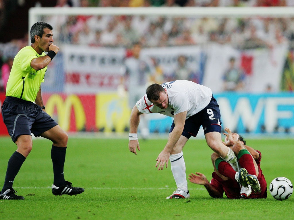 Rooney stamps on Carvalho