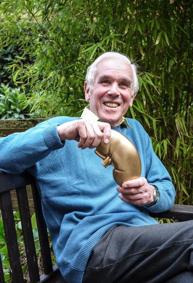 Nicholas Crace holds the ‘golden kidney’ he received to mark his support for the altruistic living donor scheme