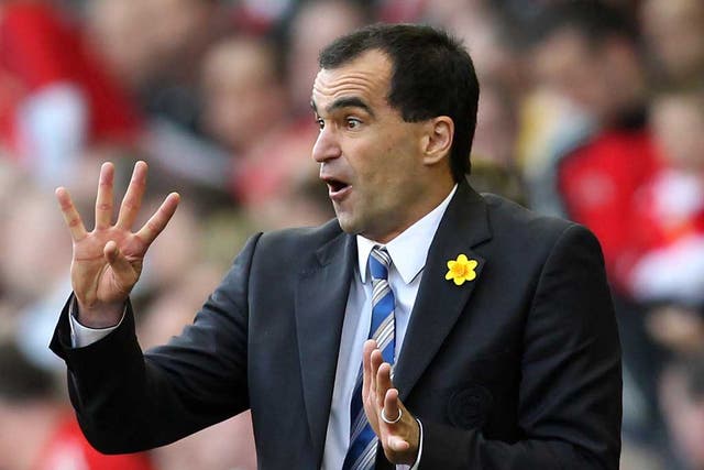 Wigan's Roberto Martinez is among the managers approached by Liverpool