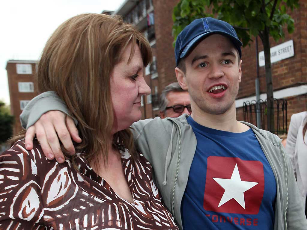 Sam Hallam and his mother, Wendy Cohen, celebrate in east London after his release