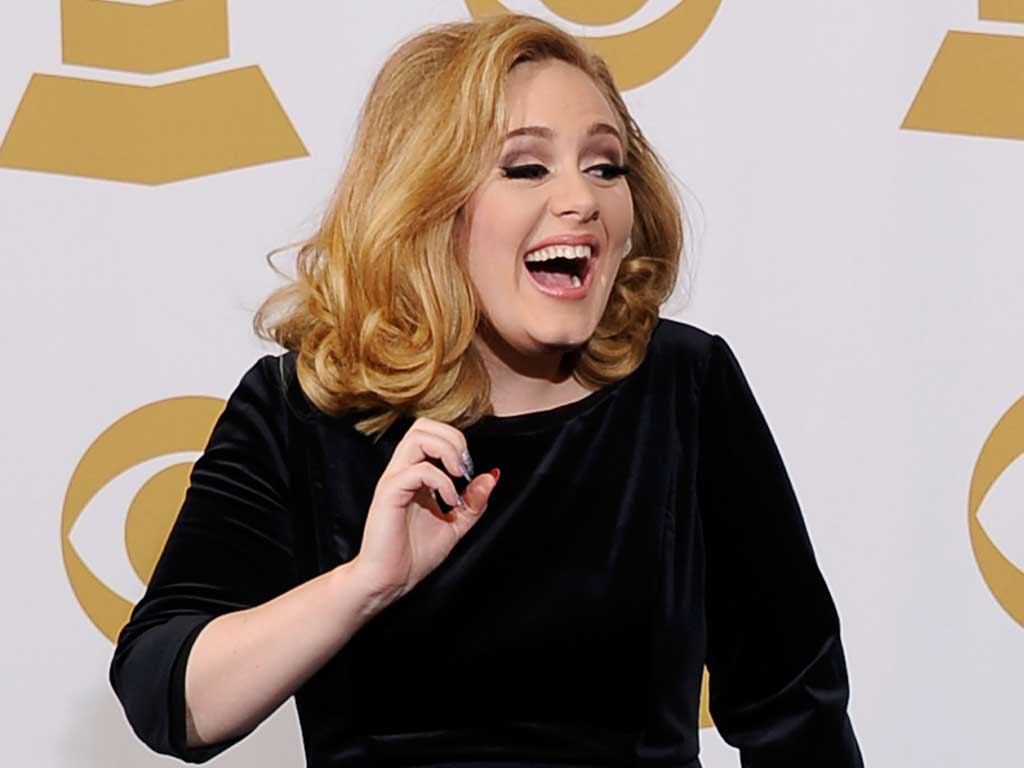 Adele was named songwriter of the year and said she had her critics to thank