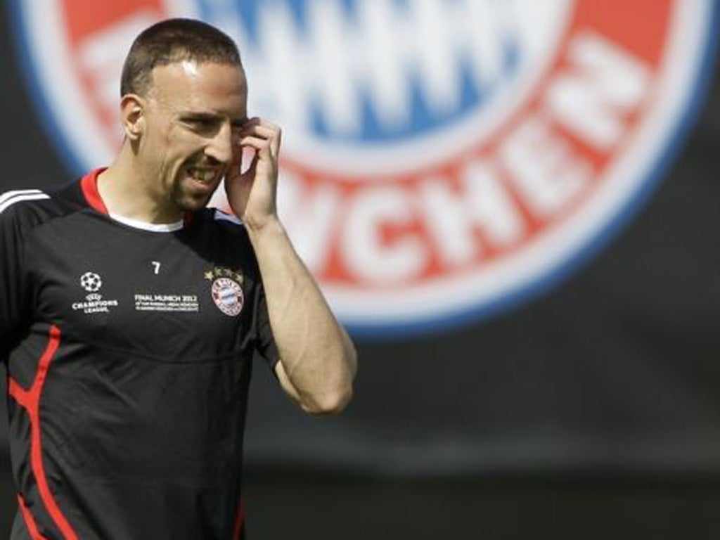 Franck Ribéry takes a break during training in Munich yesterday