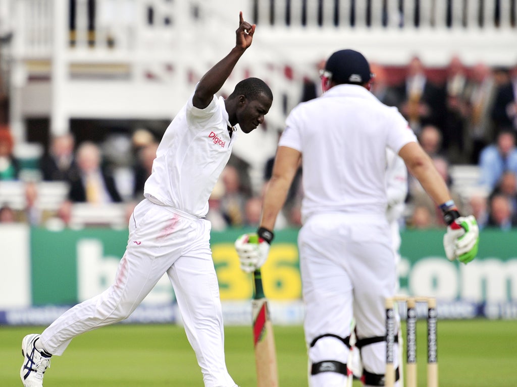 West Indies' Darren Sammy celebrates taking the wicket of England's Tim Bresnan