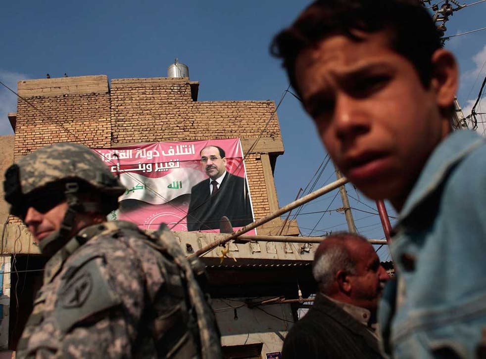 A campaign poster for Nouri al-Maliki, Iraq's increasingly dictatorial premier, in Musayyib, Babil province