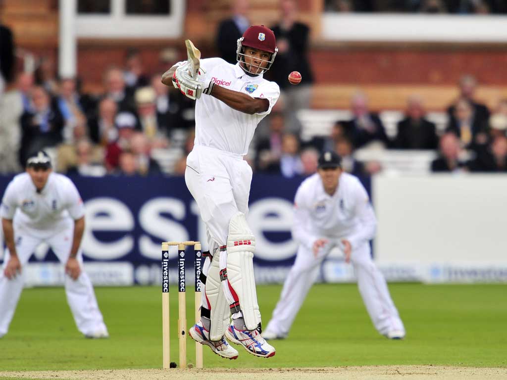 Hit and Miss: West Indies' Kieran Powell in action moments before being caught by Ian Bell