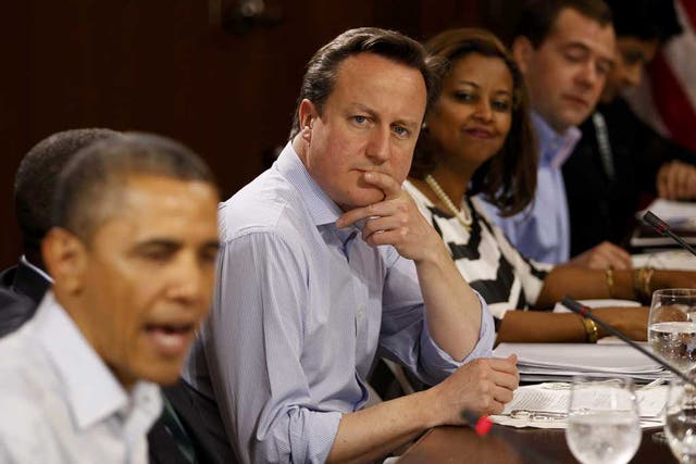 Top table: Cameron and Obama at a G8 lunch yesterday
