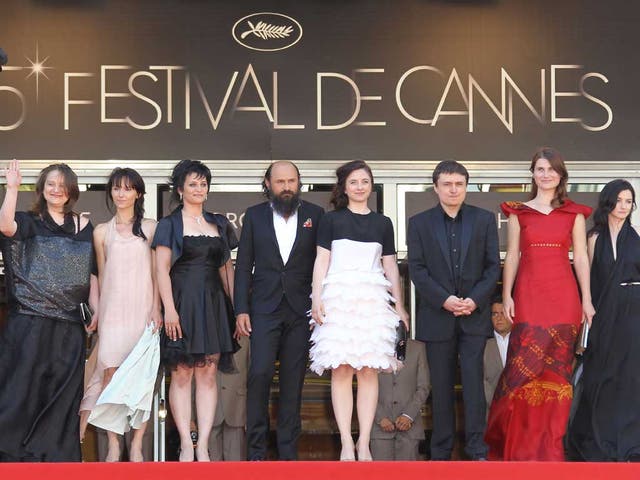 Romanian director Cristian Mungiu (third from right), with the cast of Beyond the Hills in Cannes yesterday