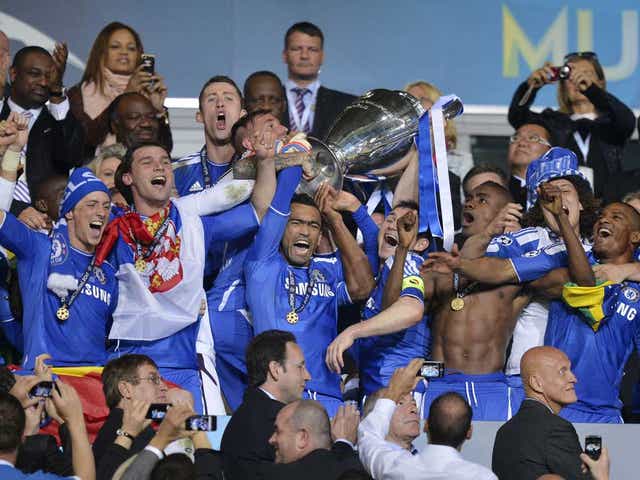Chelsea's Jose Bosingwa holds up the trophy at the end of the Champions League final