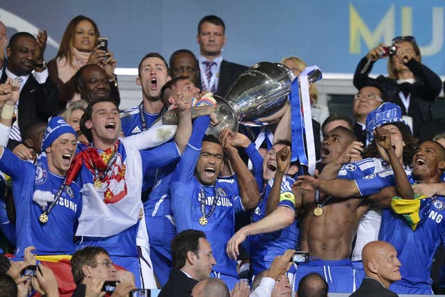 Chelsea's Jose Bosingwa holds up the trophy at the end of the Champions League final