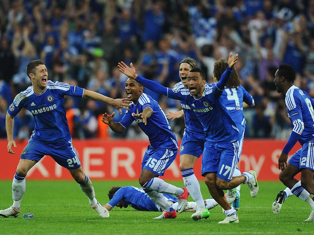 Did Didier do it? Chelsea players react ecstatically as Didier Drogba buries the last kick of the penalty shoot-out