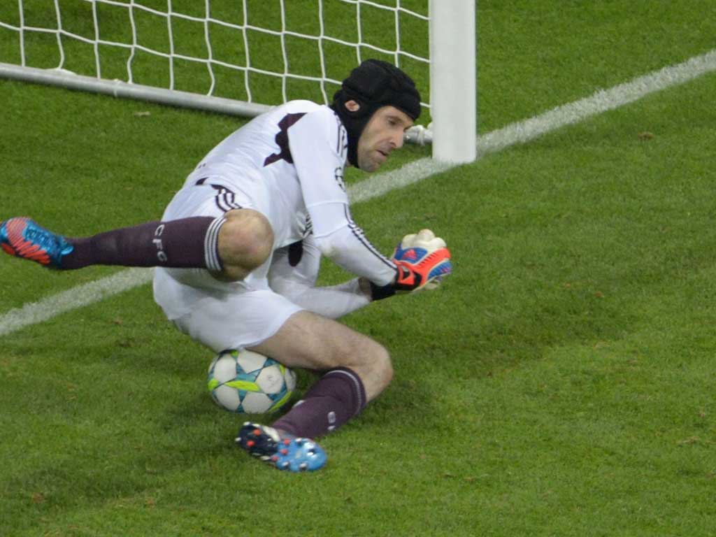 Petr Cech saves Arjen Robben's penalty in extra-time