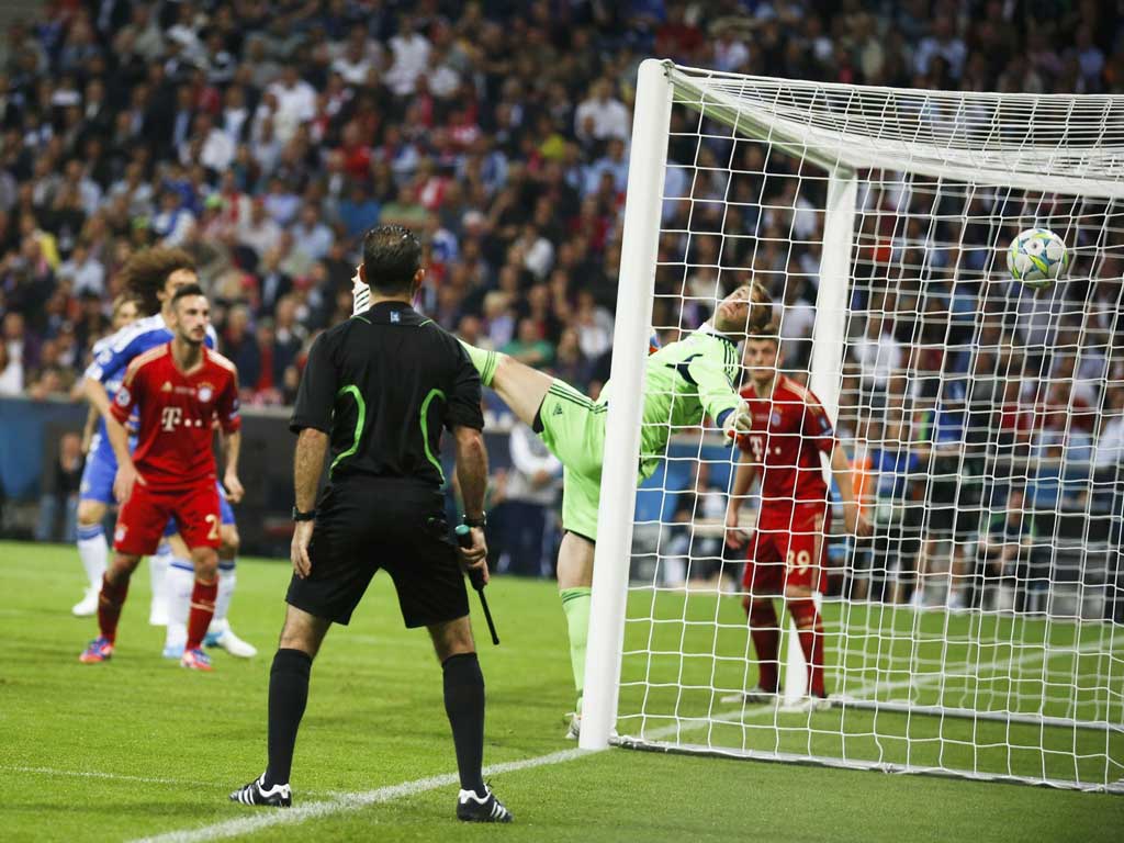 Game saver: Manuel Neuer can only look back in despair as Didier Drogba's header beats him
