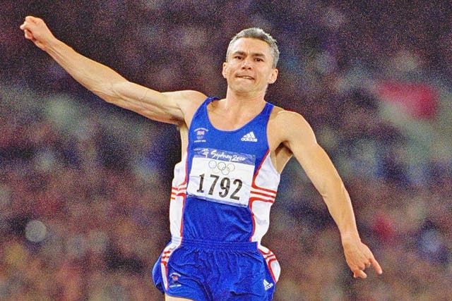 Jonathan Edwards on his way to winning gold in Sydney