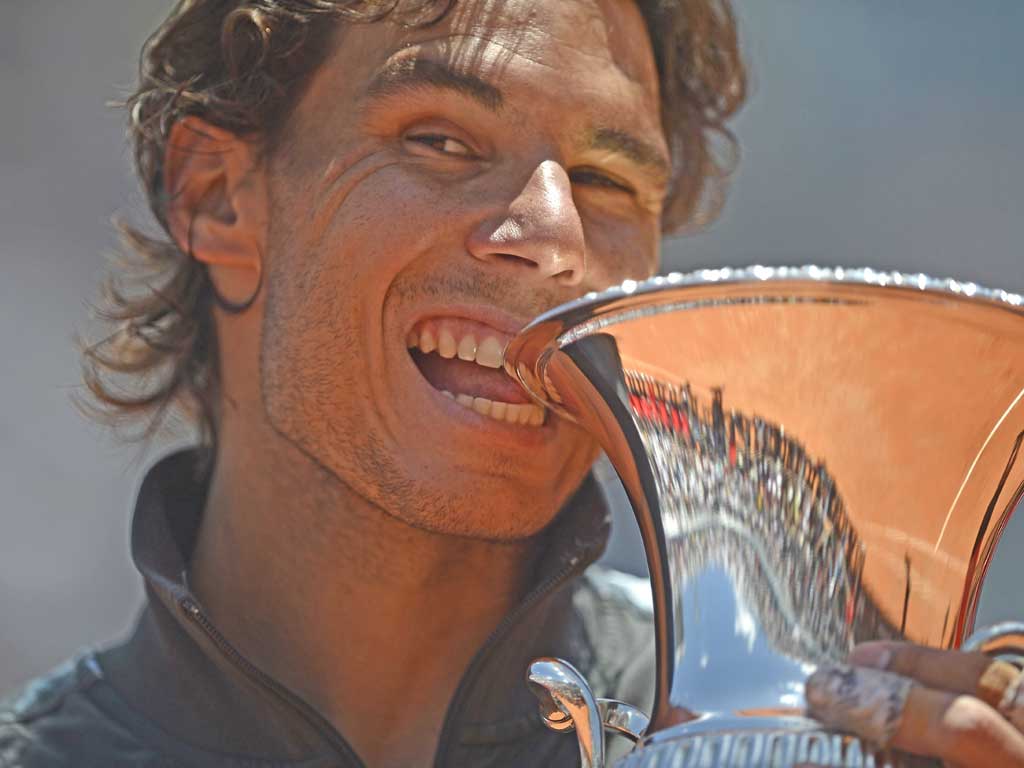 Rafael Nadal enjoys the sweet taste of success after his victory over Novak Djokovic in Rome