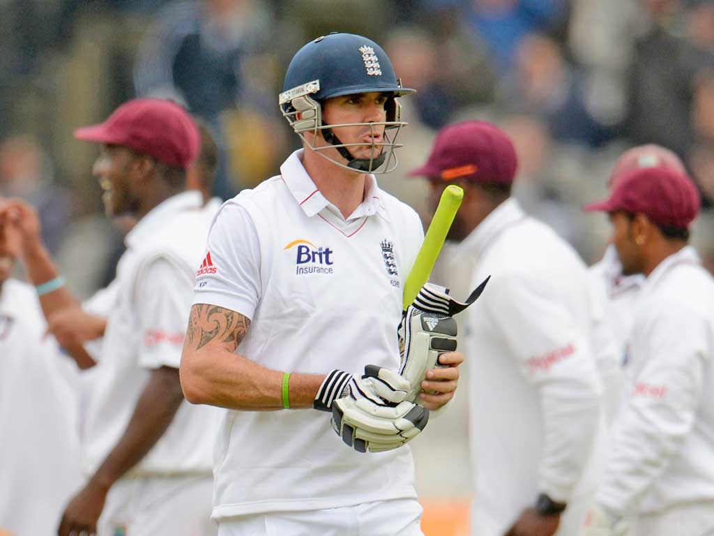 Kevin Pietersen heads for the pavilion after being dismissed