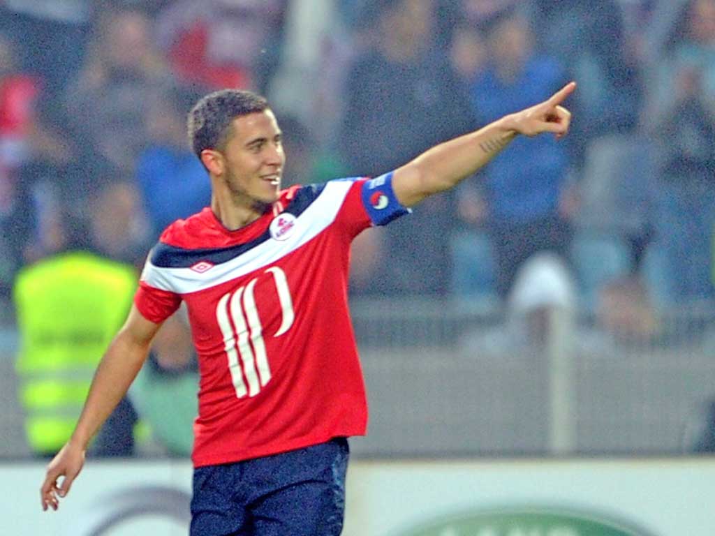 Lille's French midfielder Eden Hazard celebrates after scoring a goal against Nancy