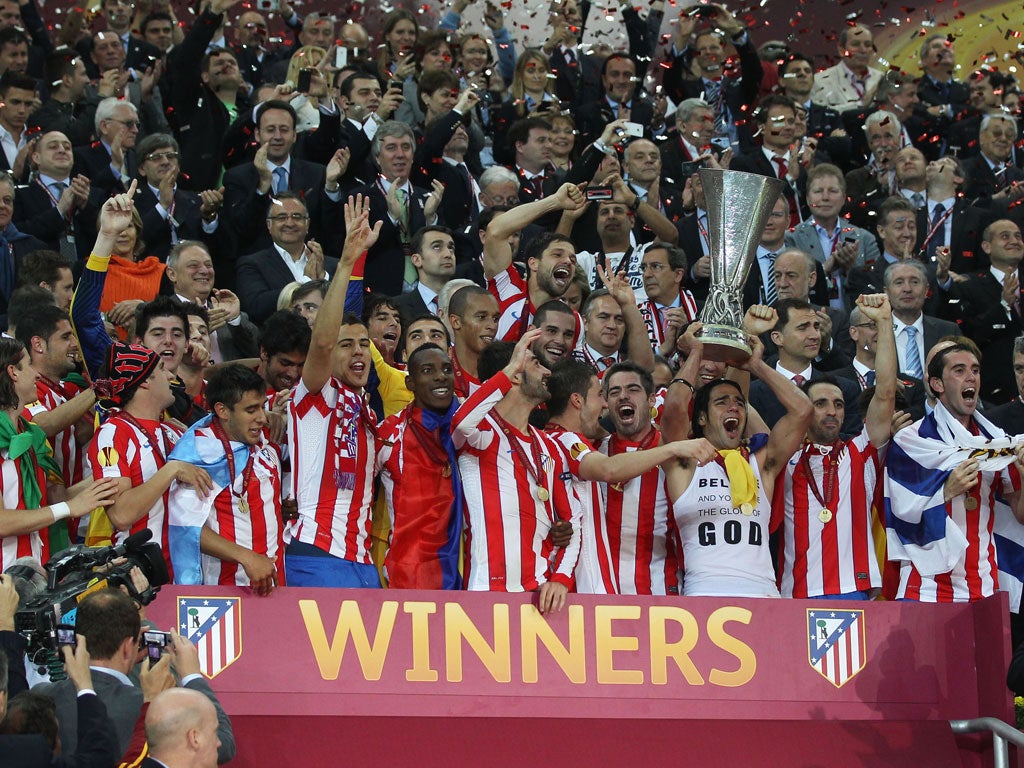 9 May 2012 Atletico Madrid celebrate after winning the Europa League against Athletic Bilbao in Bucharest. Diego Simeone’s men easily beat their fellow Spaniards 3-0 thanks to a scintillating performance from Colombian striker Radamel Falcao,