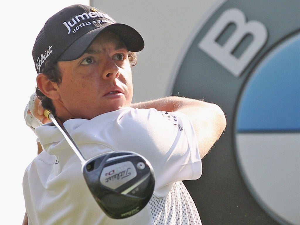 Rory McIlroy keeps his eye on the ball in yesterday's Wentworth pro-am