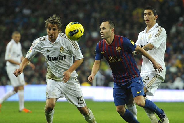 Playing out life's battles: Real Madrid playing against Barcelona in Madrid in December, 2011